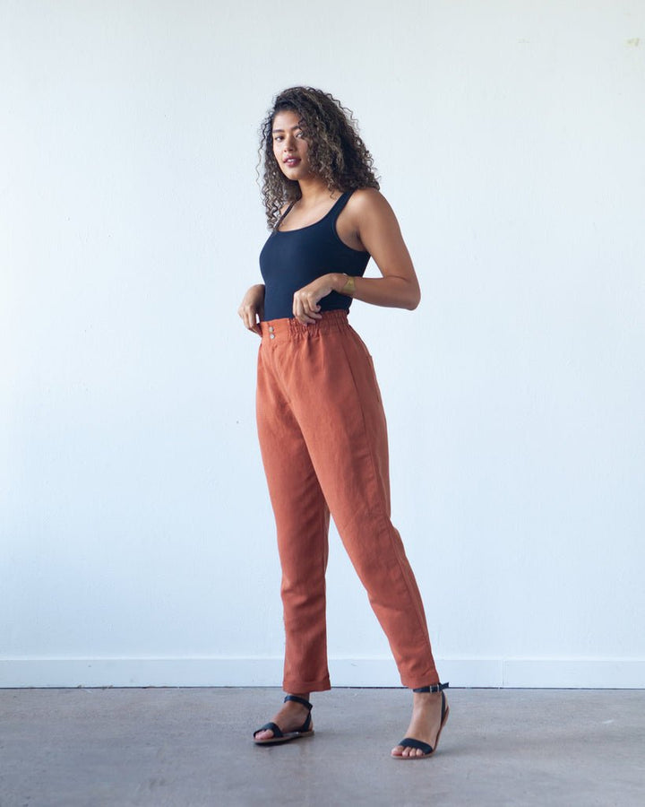 True Bias Dani Short & Pant sewing pattern with shorts and ankle-length pant variations, paperbag waist, pockets, and cuffed hem in sizes 0–18.