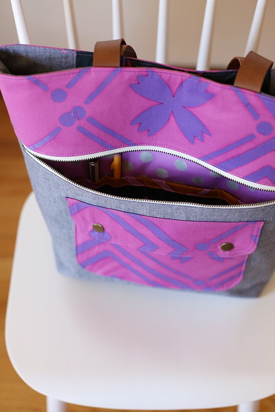 Noodlehead Caravan Tote and Pouch sewing pattern for DIY knitting bag with zippered pockets and matching accessory