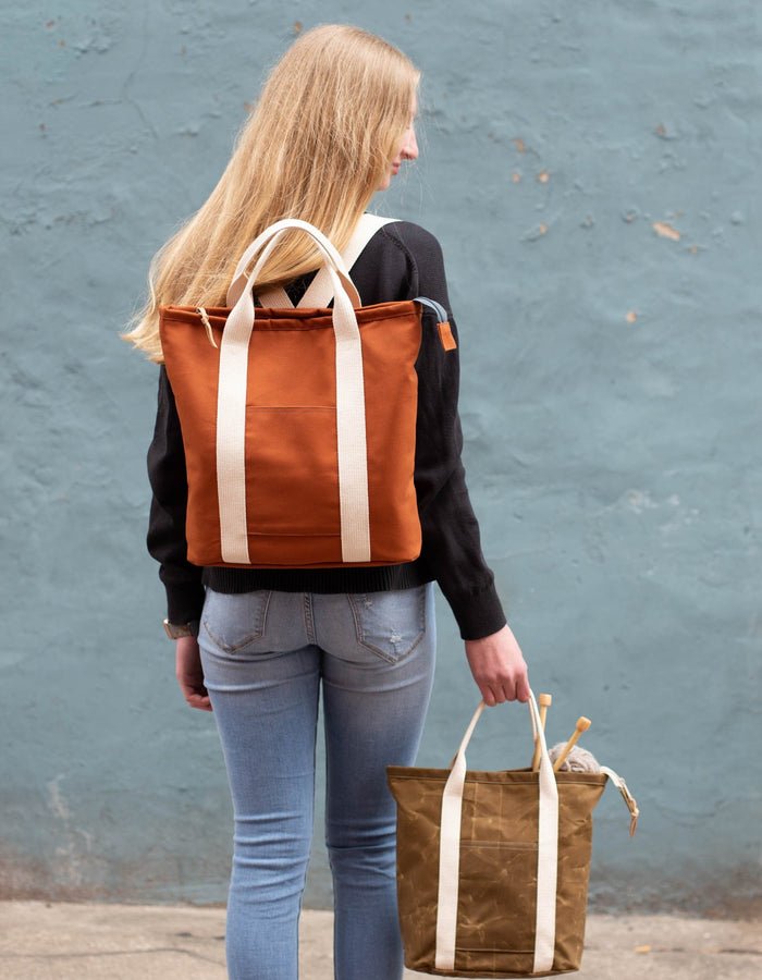 Noodlehead Buckthorn Backpack and Tote sewing pattern for DIY zip-top organizer bag with pockets