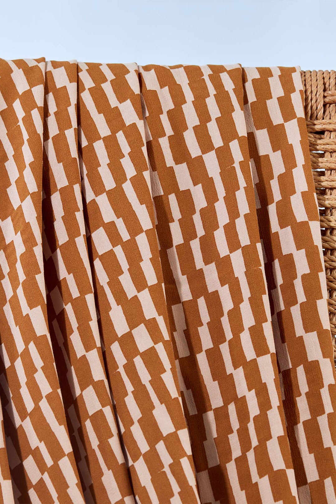 Viscose Challis Domino Ochre with White fabric – lightweight viscose material for dresses, skirts, and blouses