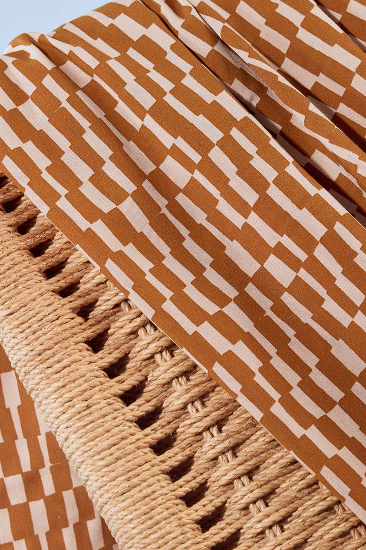Viscose Challis Domino Ochre with White fabric – lightweight viscose material for dresses, skirts, and blouses