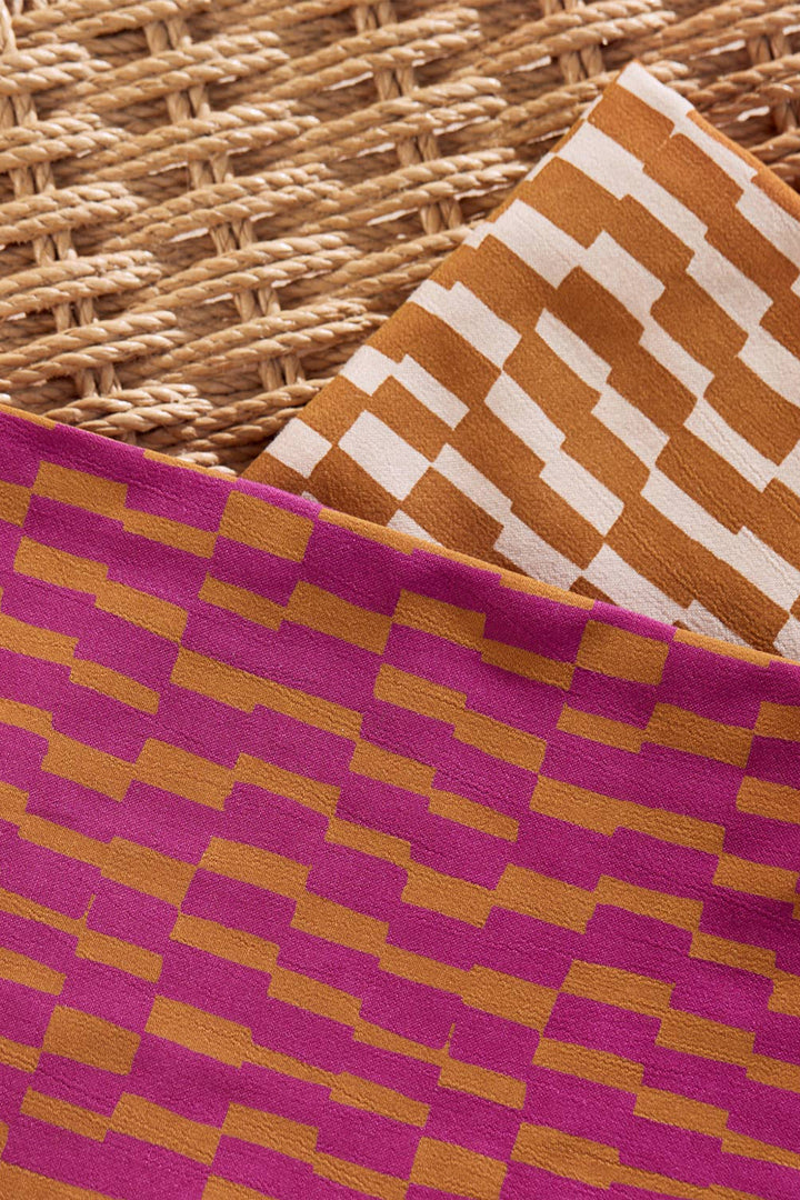 Viscose Challis Domino Ochre with White fabric – lightweight viscose material for dresses, skirts, and blouses