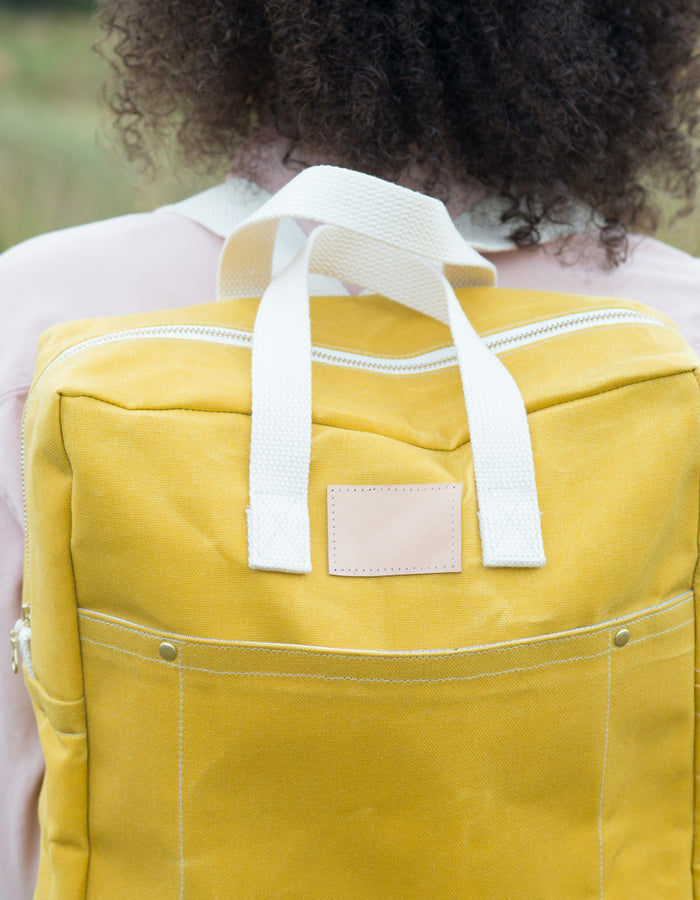 Noodlehead Making Backpack pattern in regular and mini sizes with customizable fabrics and pockets