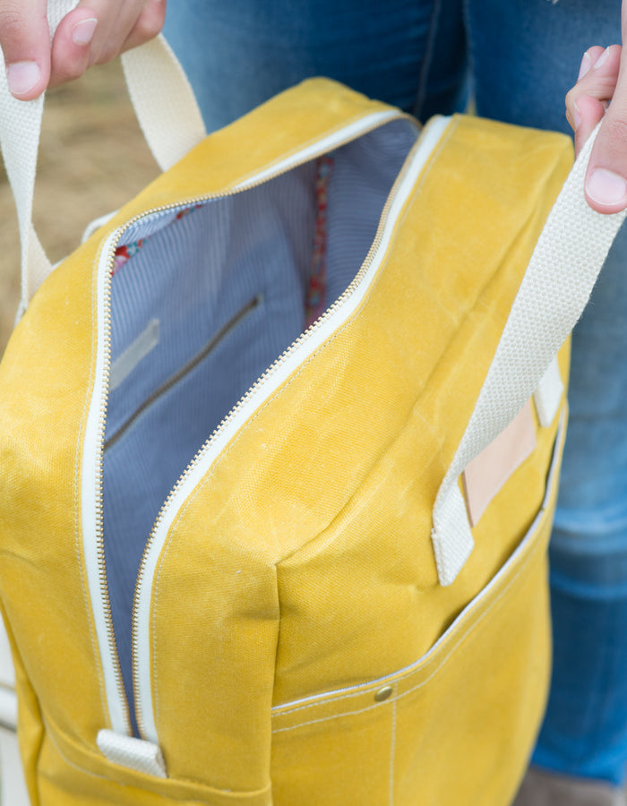 Noodlehead Making Backpack pattern in regular and mini sizes with customizable fabrics and pockets