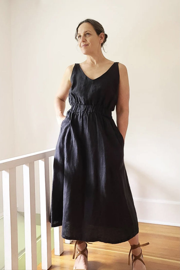 Sew House Seven Sauvie Sundress sewing pattern for standard sizes 00–20 with strappy V-neck design, pocket variations, and customizable lengths.