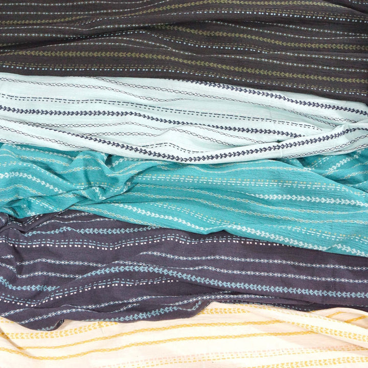 Hand-embroidered cotton gauze textile – breathable black fabric for summer garments