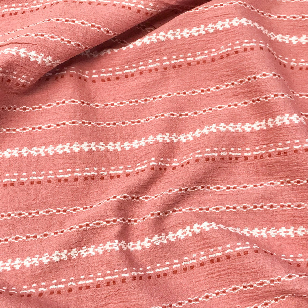 Hand-embroidered cotton gauze textile – breathable mauve fabric for summer garments