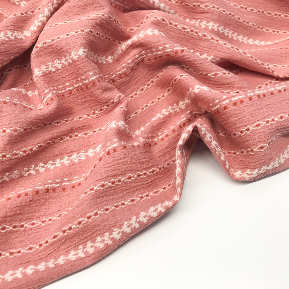 Hand-embroidered cotton gauze textile – breathable mauve fabric for summer garments