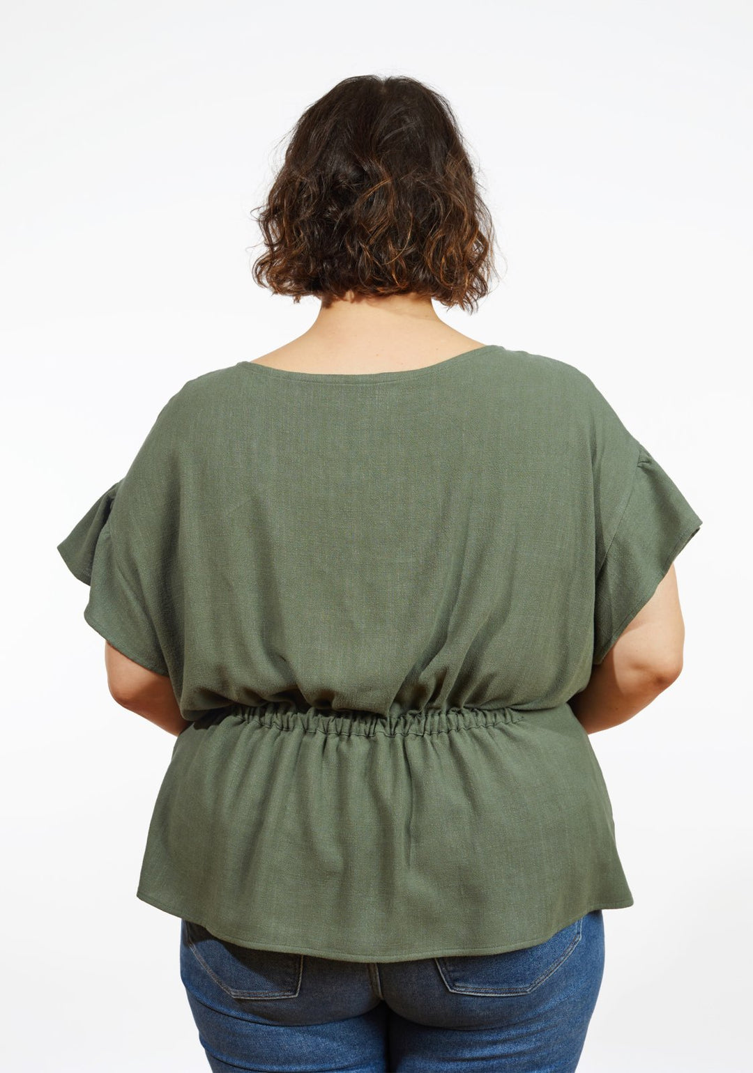 Grainline Studio Corbin Top sewing pattern for sizes 14–32, featuring ruffled cap and 3/4-length sleeve options.
