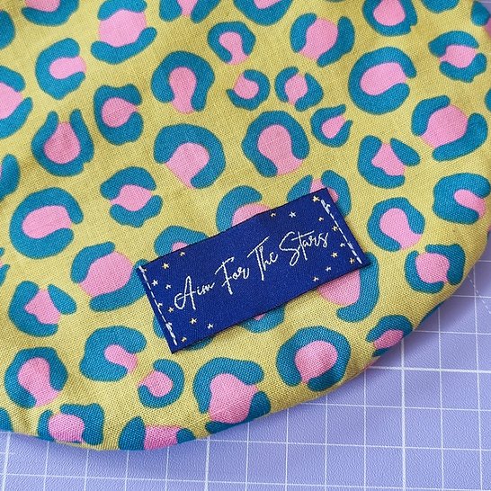 SA Labels Aim for the Stars metallic garment tags with shimmering font and star details