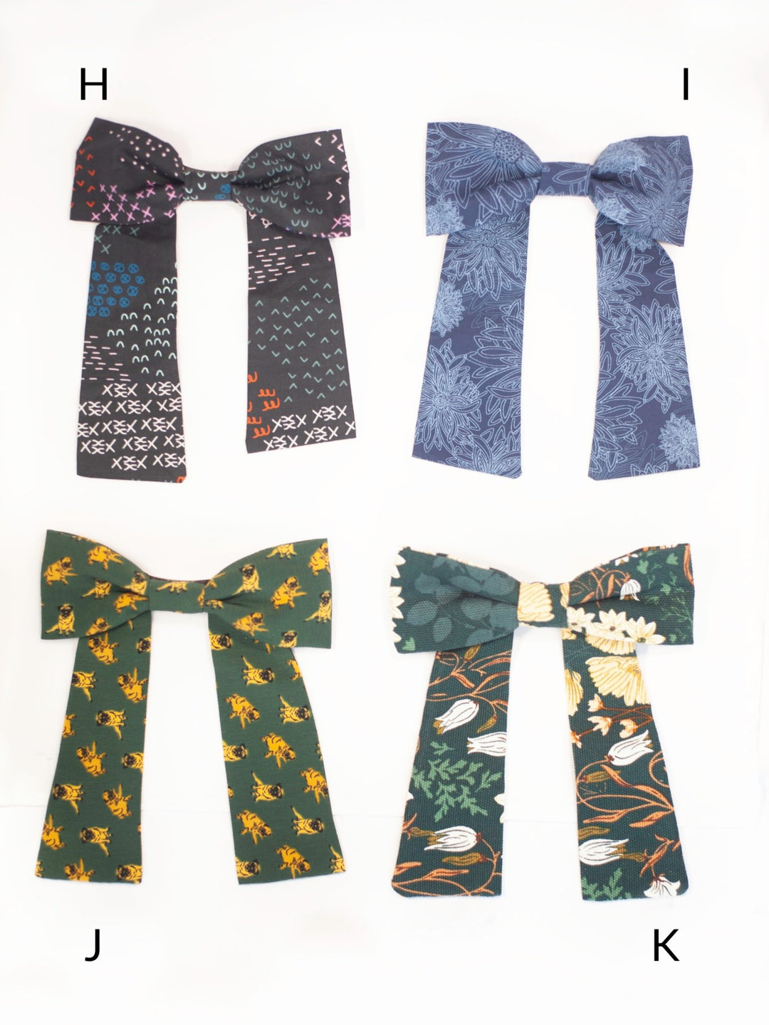 Handmade colorful classic hair bow on a barrette clip, perfect for all ages and occasions.