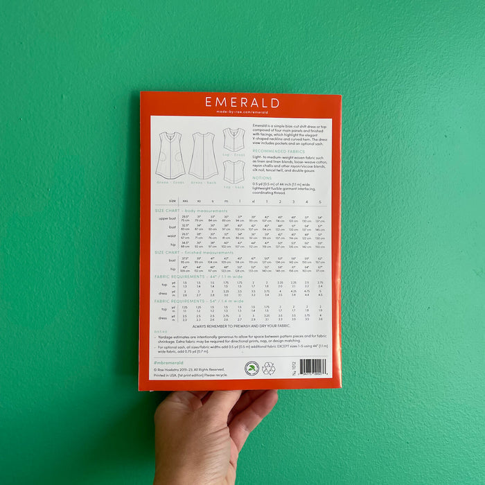 Made By Rae Emerald Dress pattern featuring a V-shaped neckline, curved hem, and optional pockets