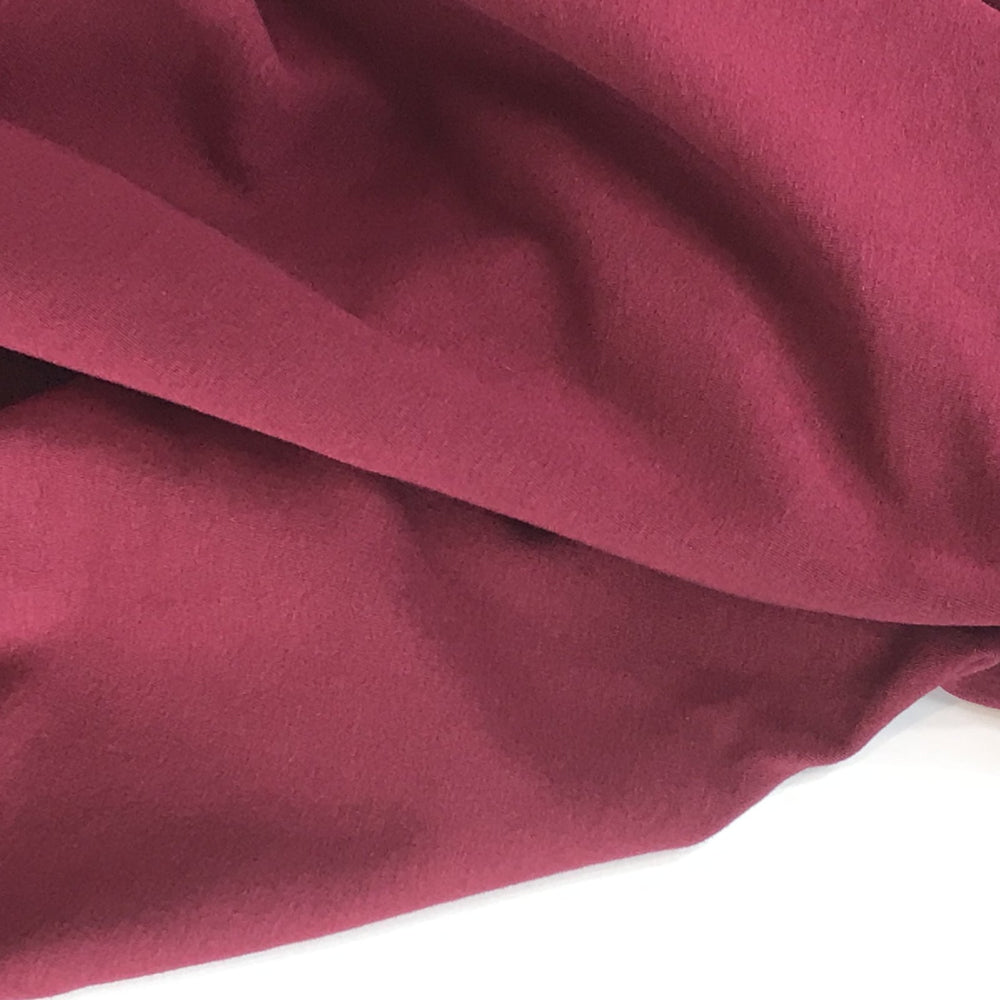 Burgundy Sweatshirt Fleece fabric with soft texture and rich color, ideal for cozy and stylish garments

