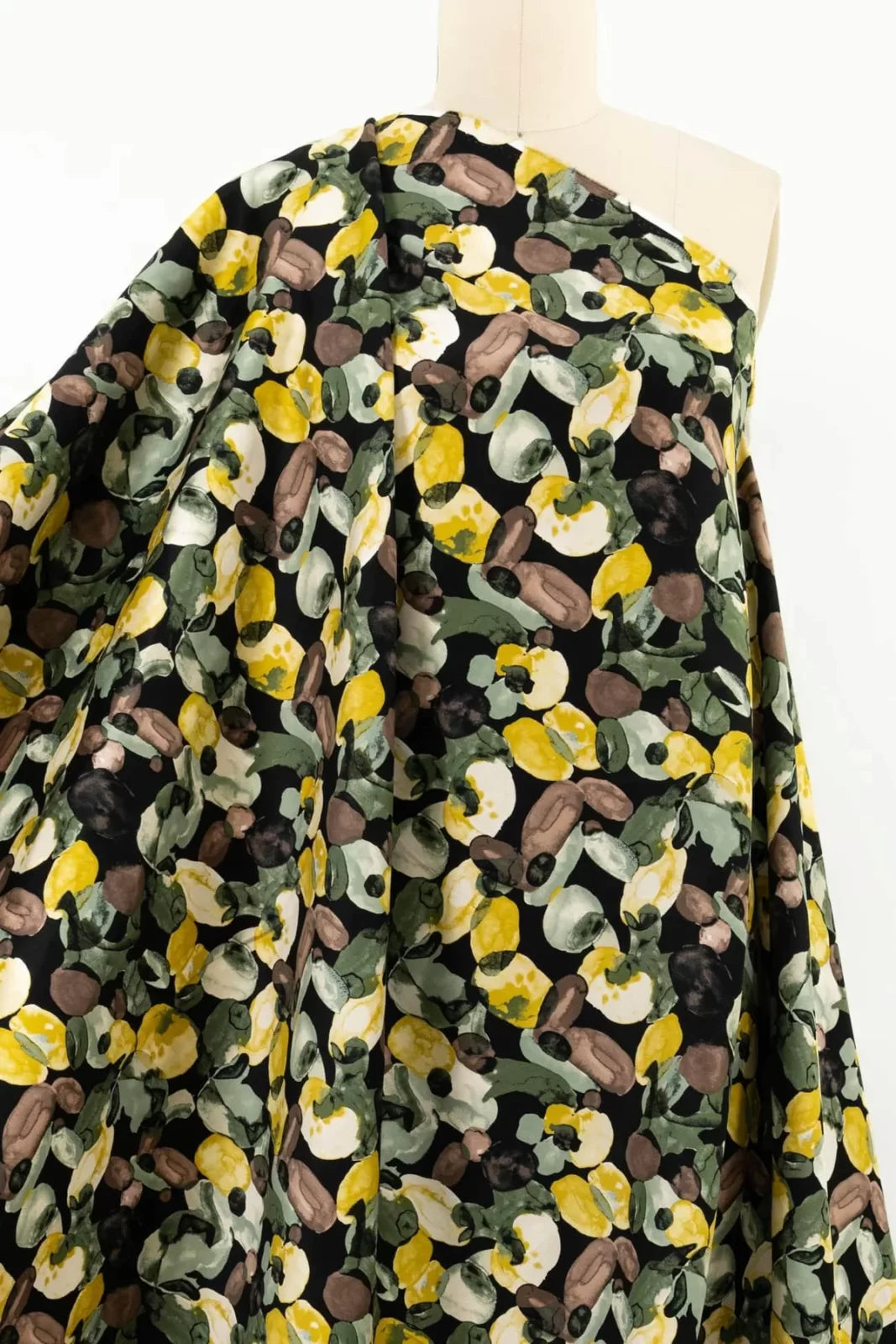 Cotton Stretch Sateen Green Dollops – 98% cotton, 2% Lycra, 57/58 inches wide, smooth fabric with autumnal green, pear, sage, and mocha dollops for jackets, skirts, and shirts