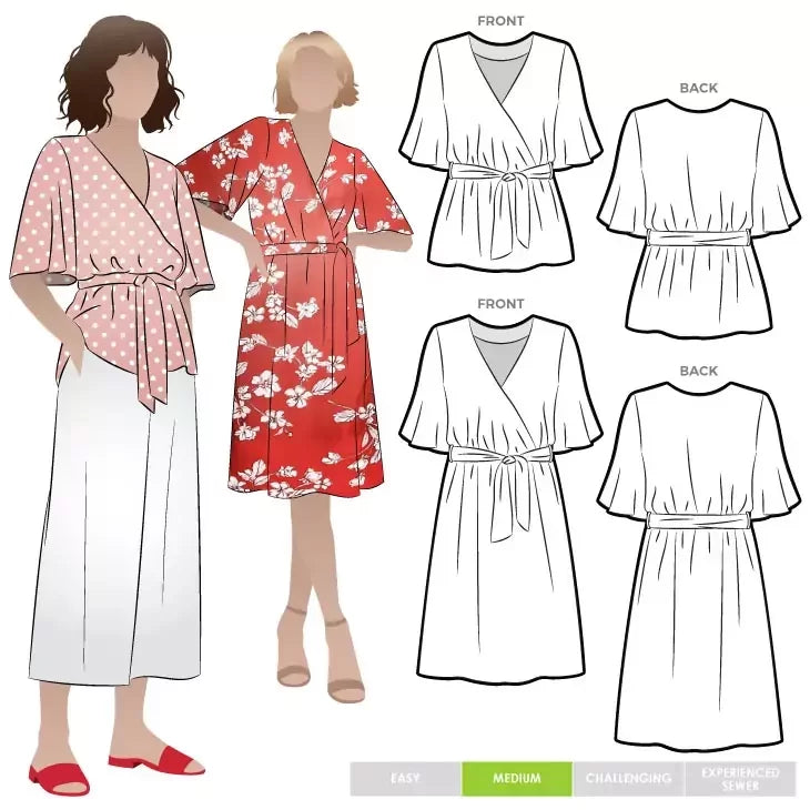 Style Arc Bonita Dress sewing pattern with wrap front, fluted sleeves, and tie belt design