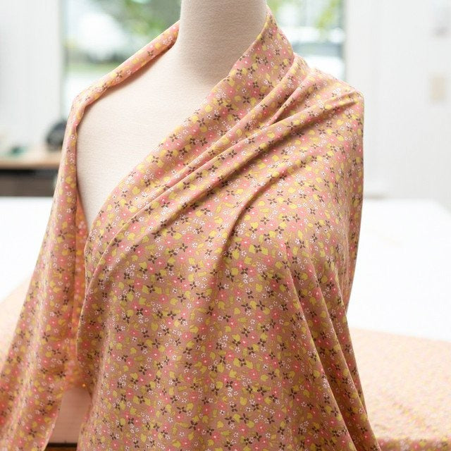 Rayon Challis Soft Spring Floral Fabric in muted rose with bright lime green floral print