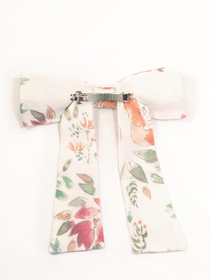 Handmade colorful classic hair bow on a barrette clip, perfect for all ages and occasions.