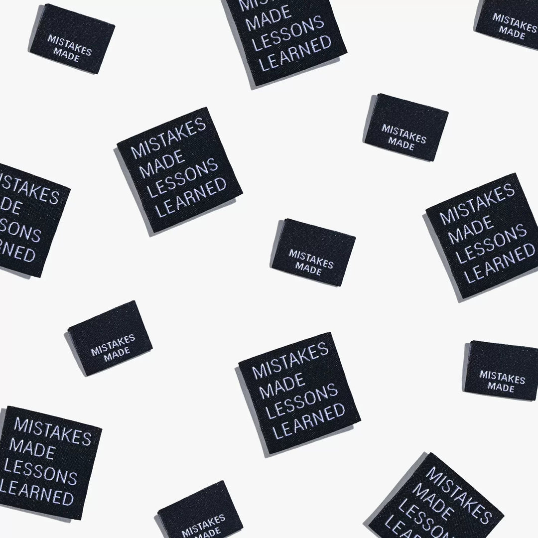 Motivational woven labels reading 'Mistakes Made Lessons Learned' in side seam and end fold styles by Kylie and the Machine - for proud skill-building sewists