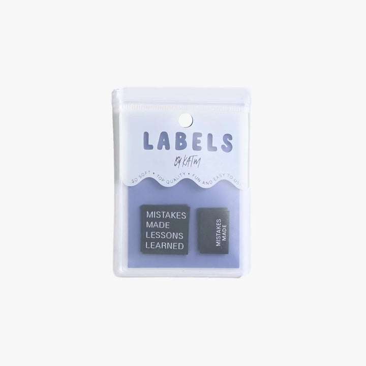 Motivational woven labels reading 'Mistakes Made Lessons Learned' in side seam and end fold styles by Kylie and the Machine - for proud skill-building sewists