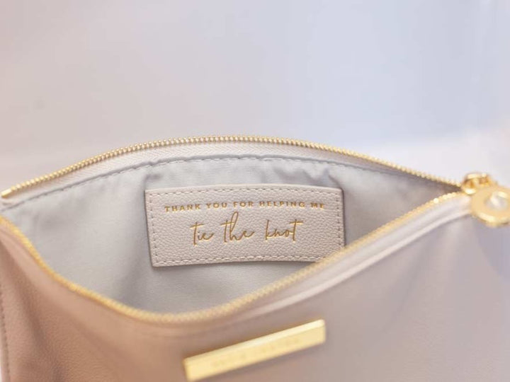 Katie Loxton Message Clutch in elegant design with zipper closure, available in multiple colors.