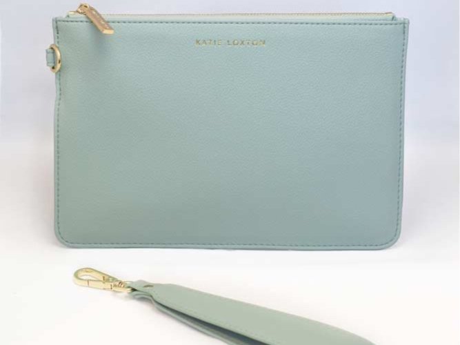 Everyday wristlet clutch in neutral color with removable strap and minimalist design.