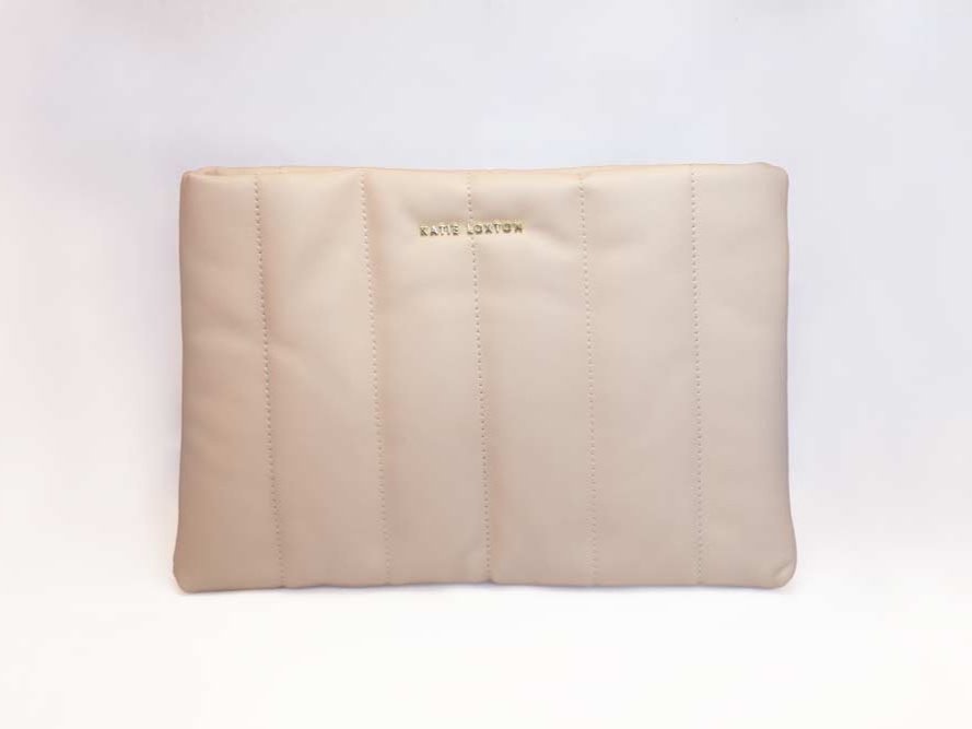 Kendra Quilted Clutch by Katie Loxton in soft vegan leather with quilted stripe pattern and gold-tone hardware.