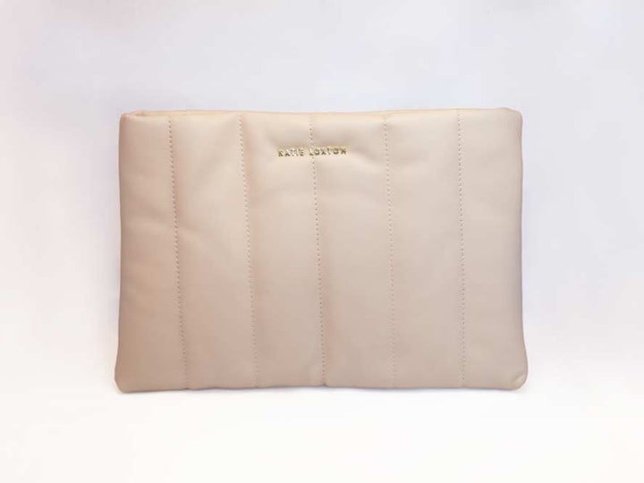 Kendra Quilted Clutch by Katie Loxton in soft vegan leather with quilted stripe pattern and gold-tone hardware.