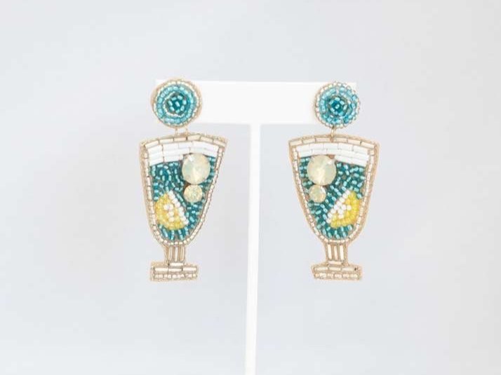Vibrant Eclectic Beaded Earrings with playful designs like festive Christmas patterns, alcohol bottles, and bumblebees.