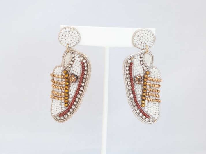 Vibrant Eclectic Beaded Earrings with playful designs like festive Christmas patterns, alcohol bottles, and bumblebees.