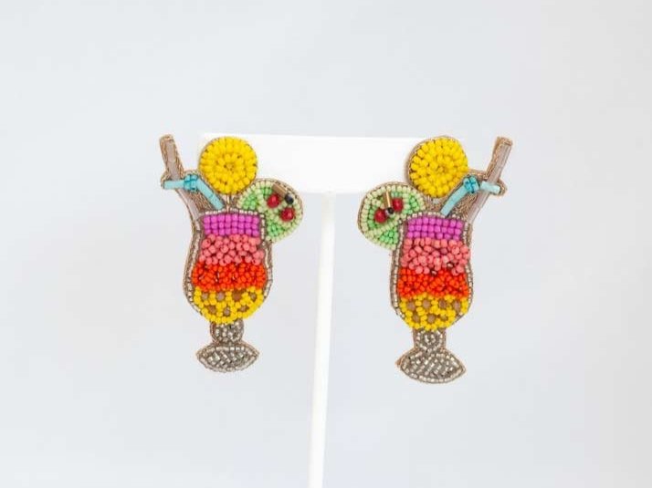 Vibrant Eclectic Beaded Earrings with playful designs like festive Christmas patterns, alcohol bottles, and bumblebees.