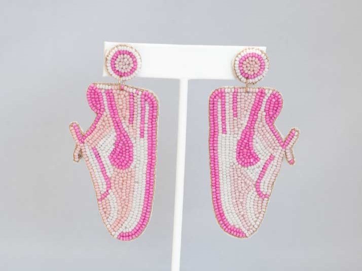 Vibrant Eclectic Beaded Earrings with playful designs like festive Christmas patterns, alcohol bottles, and bumblebees.
