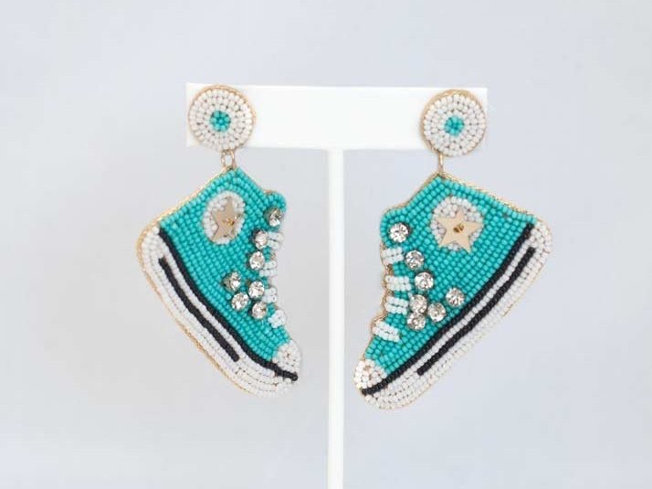 Vibrant Eclectic Beaded Earrings with playful designs like festive Christmas patterns, alcohol bottles, and bumblebees.