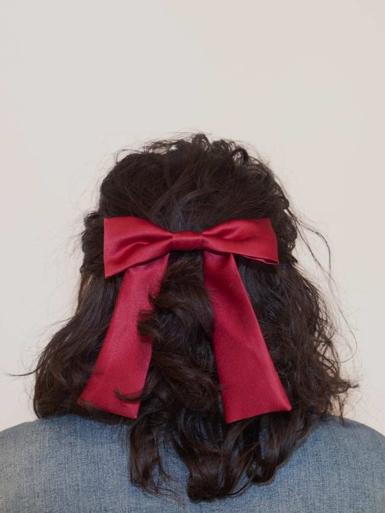 Handmade colorful classic hair bow on a barrette clip, perfect for all ages and occasions.