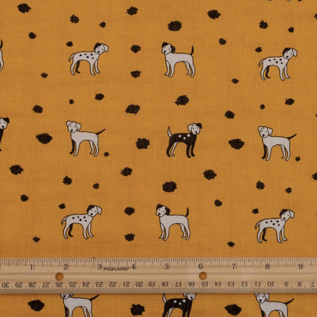 Rayon Cotton Voile fabric with playful black and white puppy print on sunshine yellow background, 50% rayon 50% cotton, 140cm width