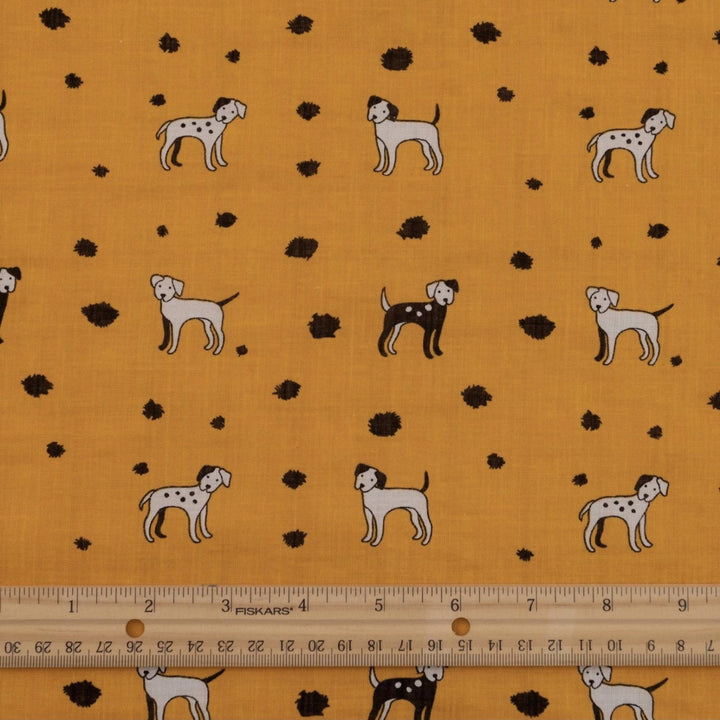 Rayon Cotton Voile fabric with playful black and white puppy print on sunshine yellow background, 50% rayon 50% cotton, 140cm width