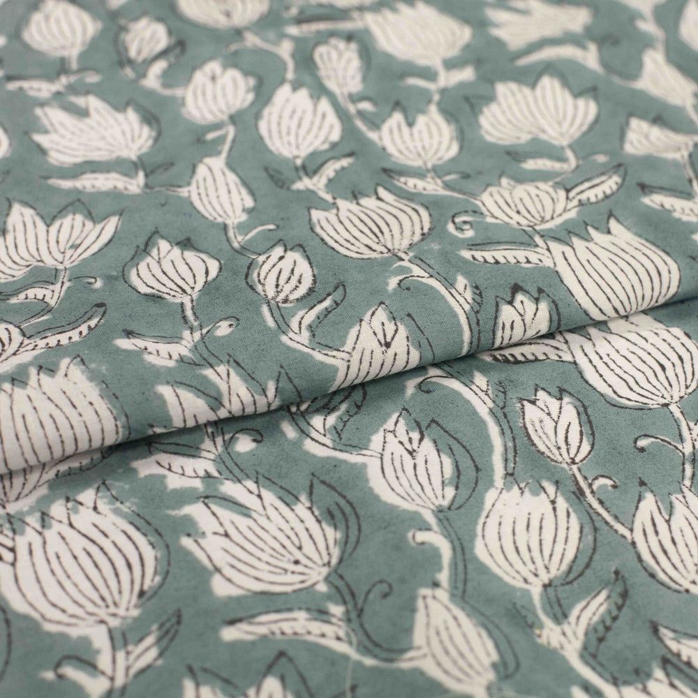 Vintage-inspired cotton fabric with delicate white tulips - lightweight semi-sheer