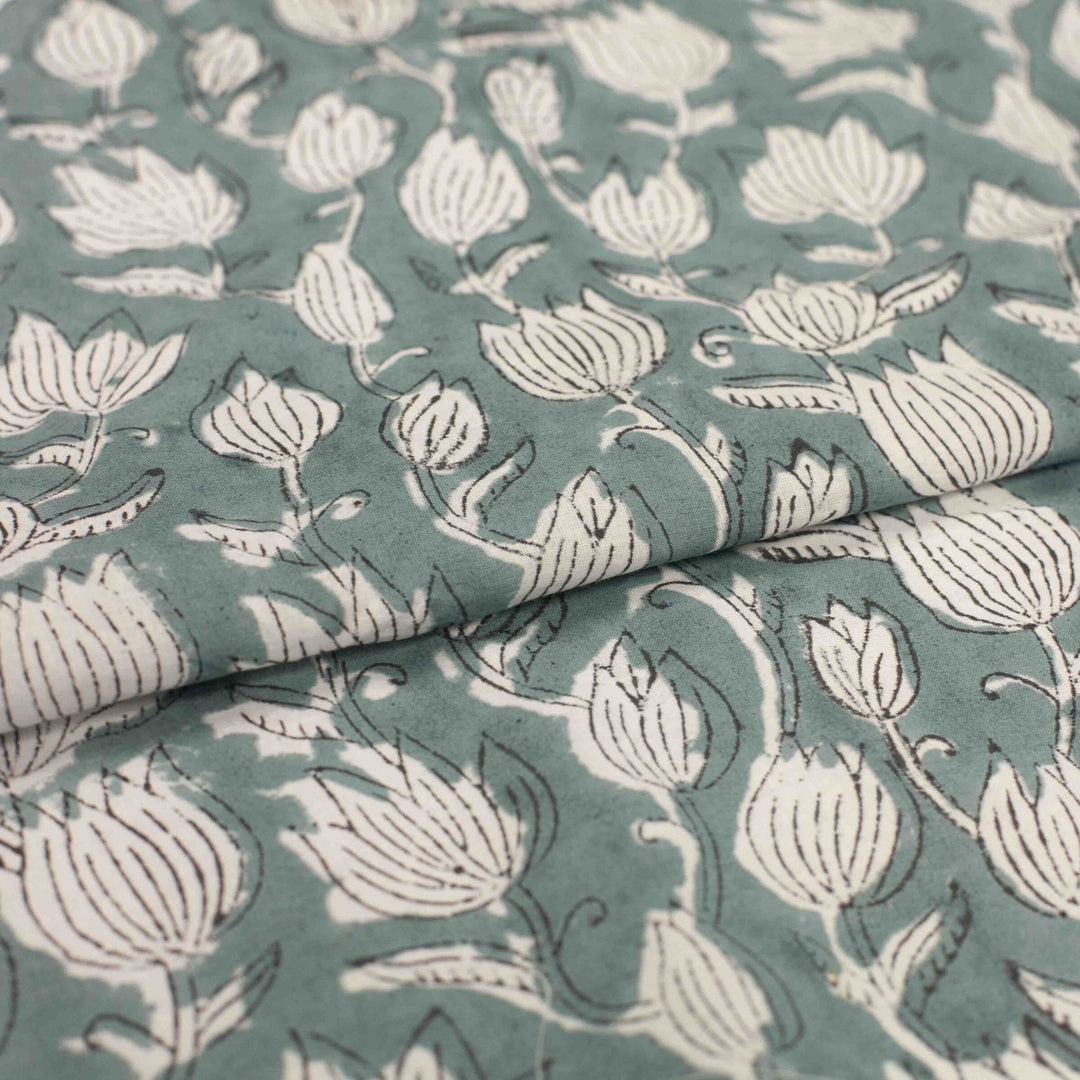 Vintage-inspired cotton fabric with delicate white tulips - lightweight semi-sheer