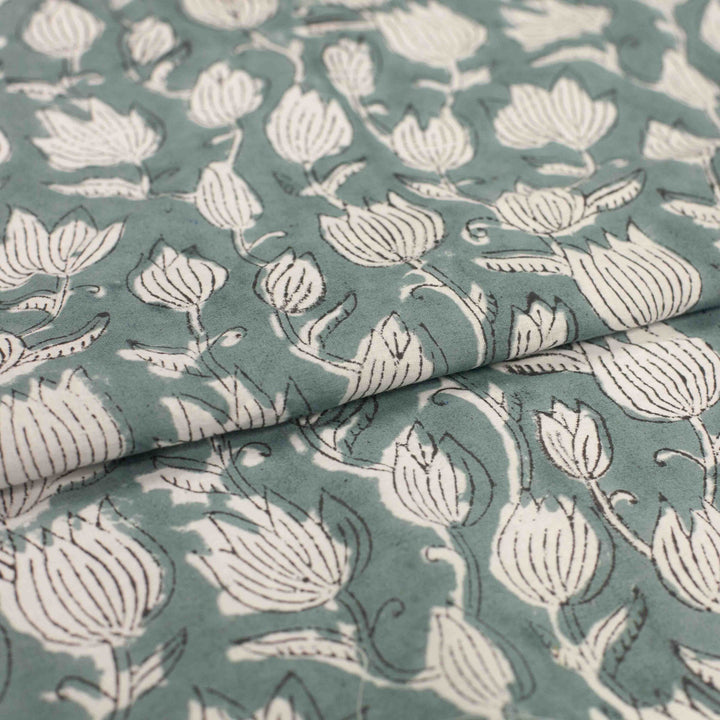 Vintage-inspired cotton fabric with delicate white tulips - lightweight semi-sheer