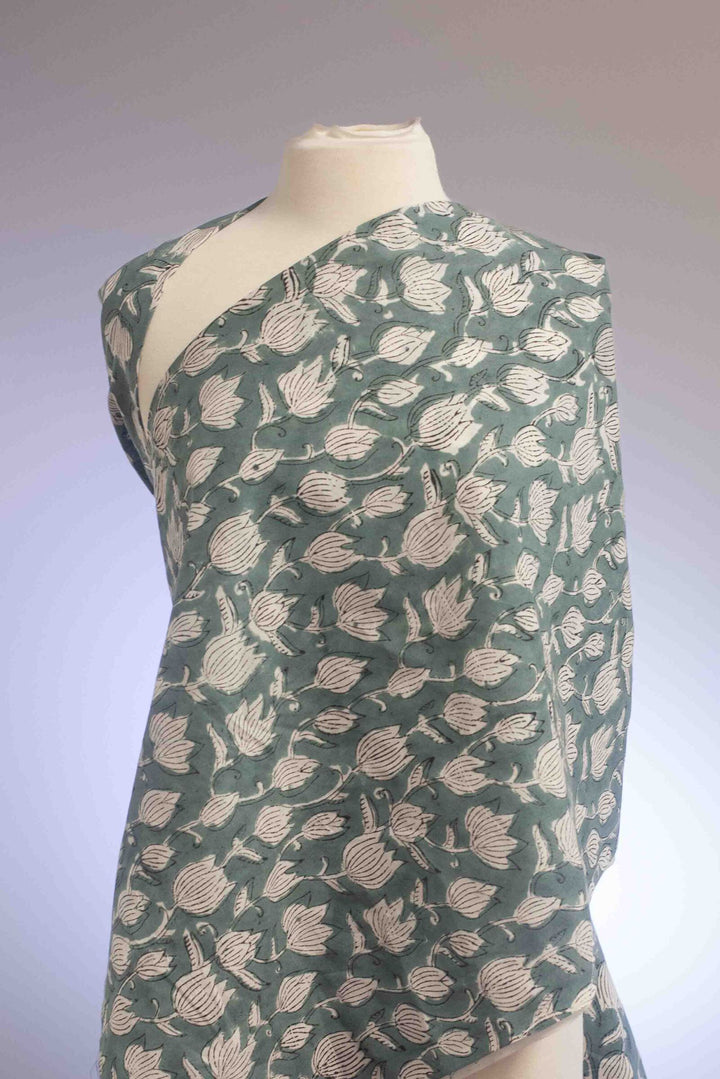 Vintage-inspired cotton fabric with delicate white tulips - lightweight semi-sheer