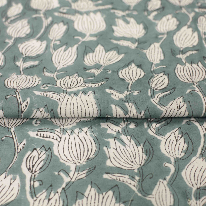 Vintage-inspired cotton fabric with delicate white tulips - lightweight semi-sheer
