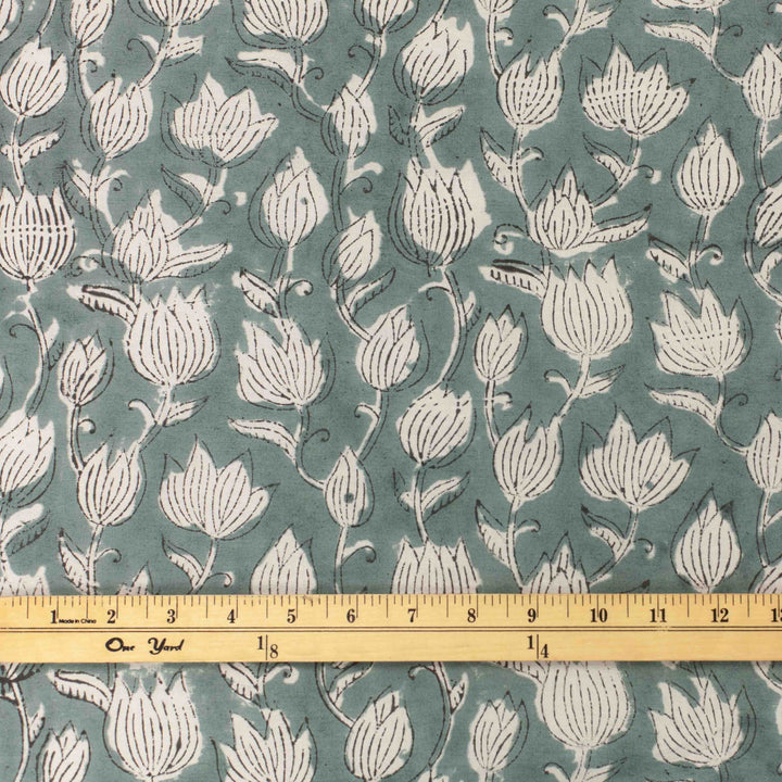 Vintage-inspired cotton fabric with delicate white tulips - lightweight semi-sheer