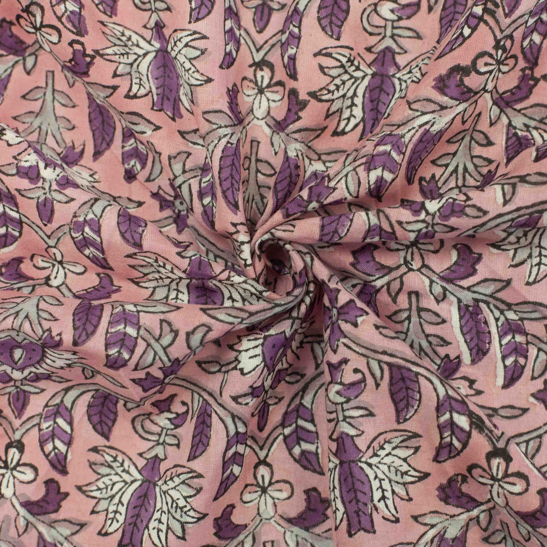 Hand-printed Forestine cotton fabric - soft pink background with brown-purple motifs
