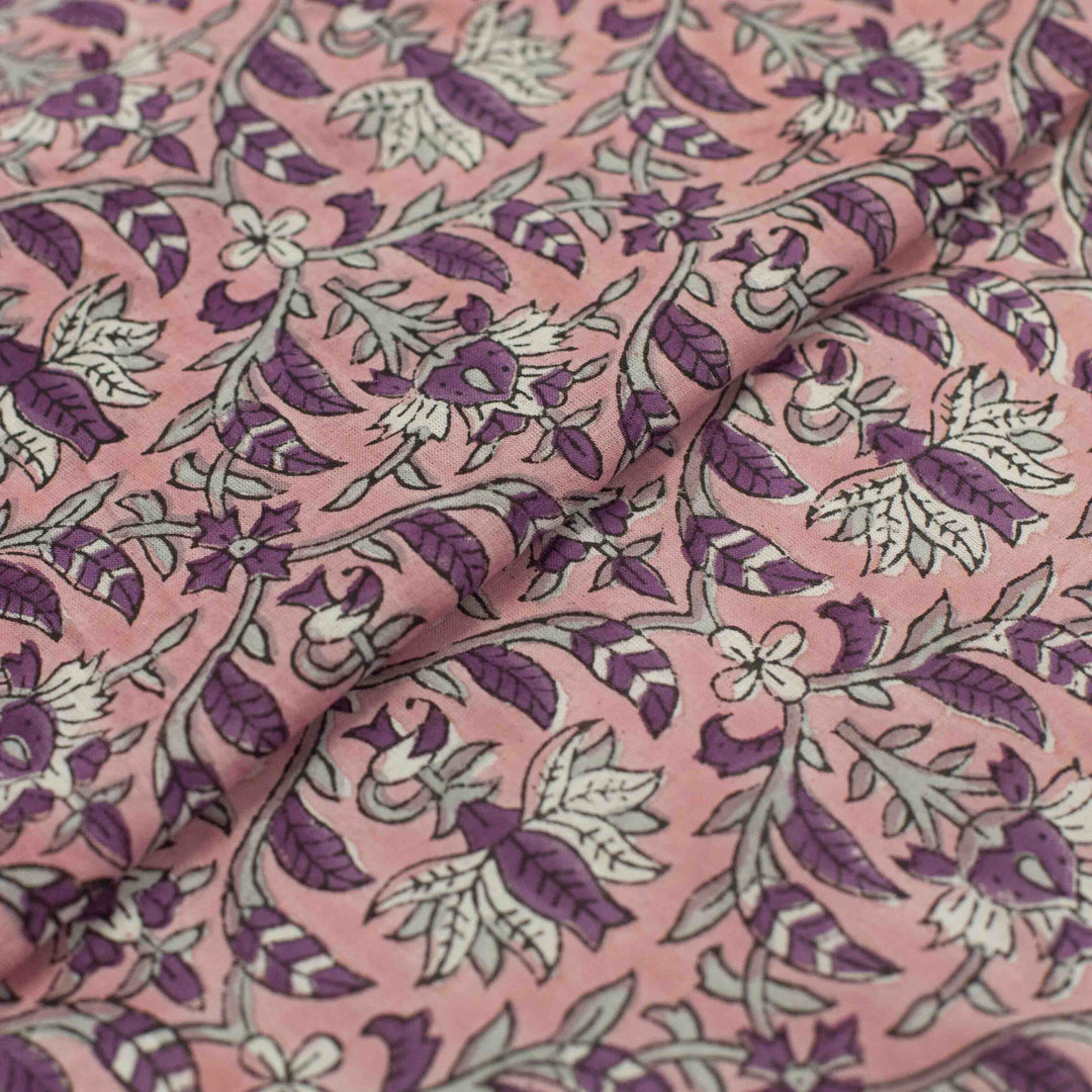 Hand-printed Forestine cotton fabric - soft pink background with brown-purple motifs