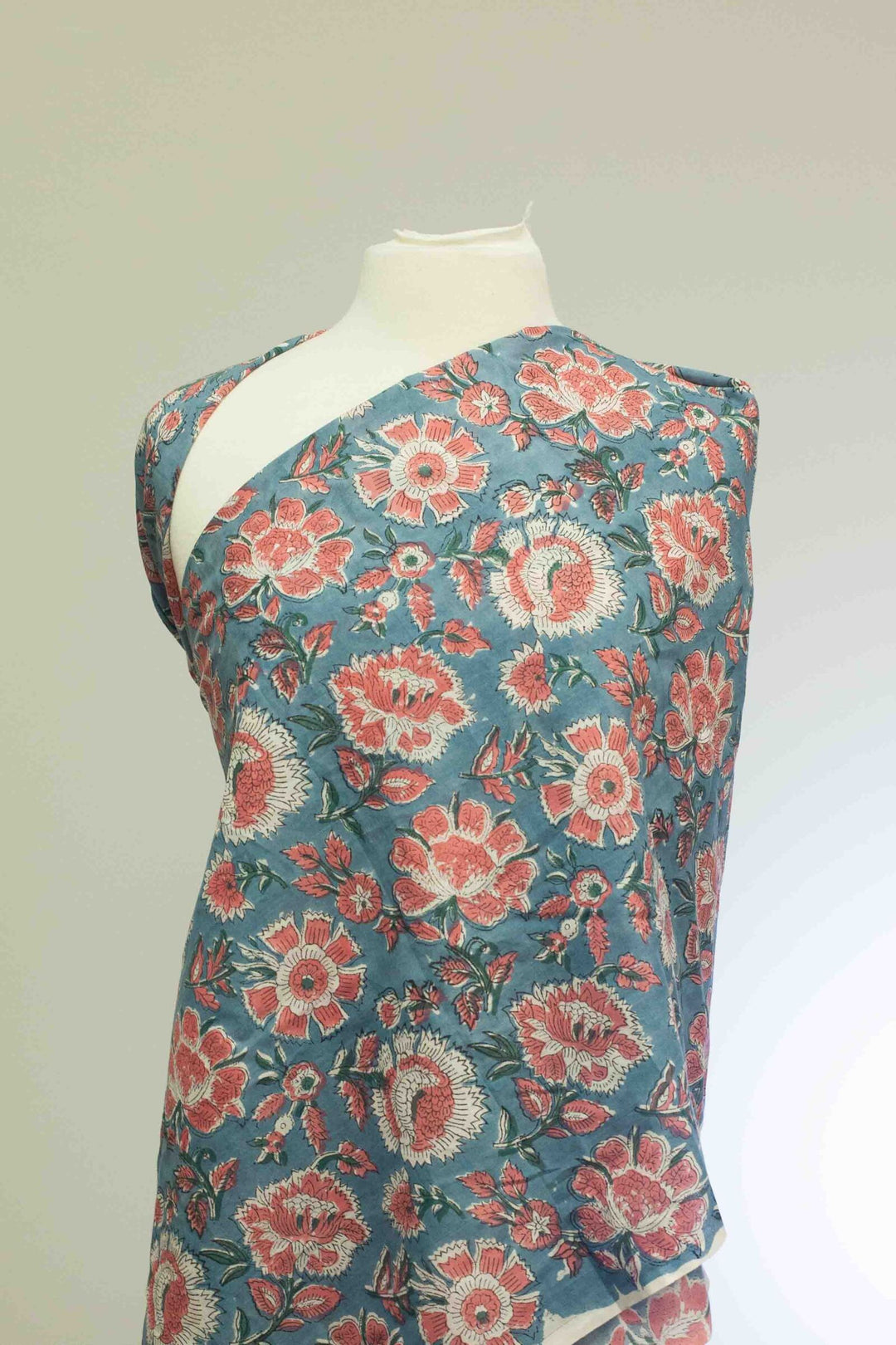 Orange floral printed Indian cotton fabric – slate blue background, 44" wide