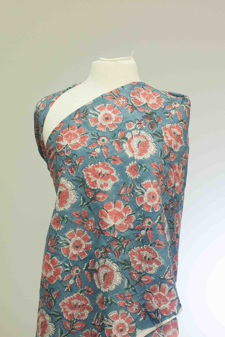 Orange floral printed Indian cotton fabric – slate blue background, 44" wide