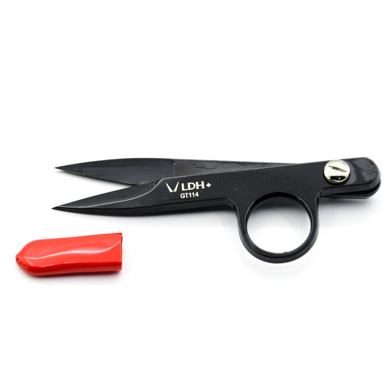 Black scissors with a red clip on a white background