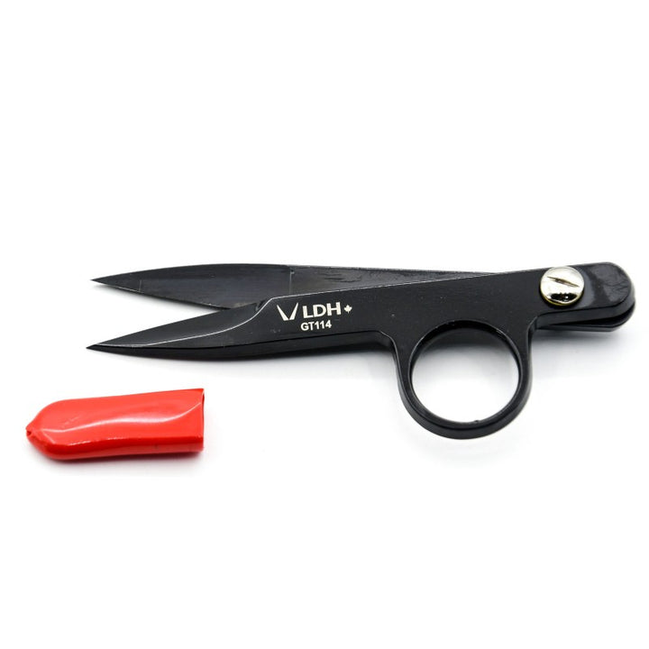 Black scissors with a red clip on a white background
