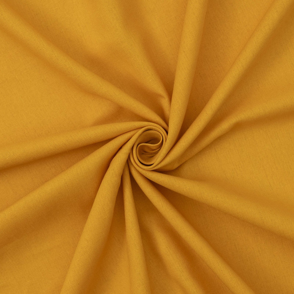 Laundered linen fabric in marigold – 100% linen, 6 oz medium weight, pre-washed, 58 inches wide, soft drape for dresses and tops