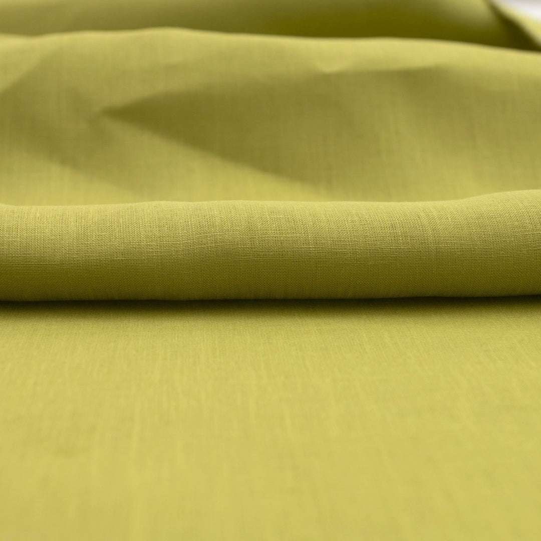 Vibrant apple green linen fabric for sewing summer dresses and tops