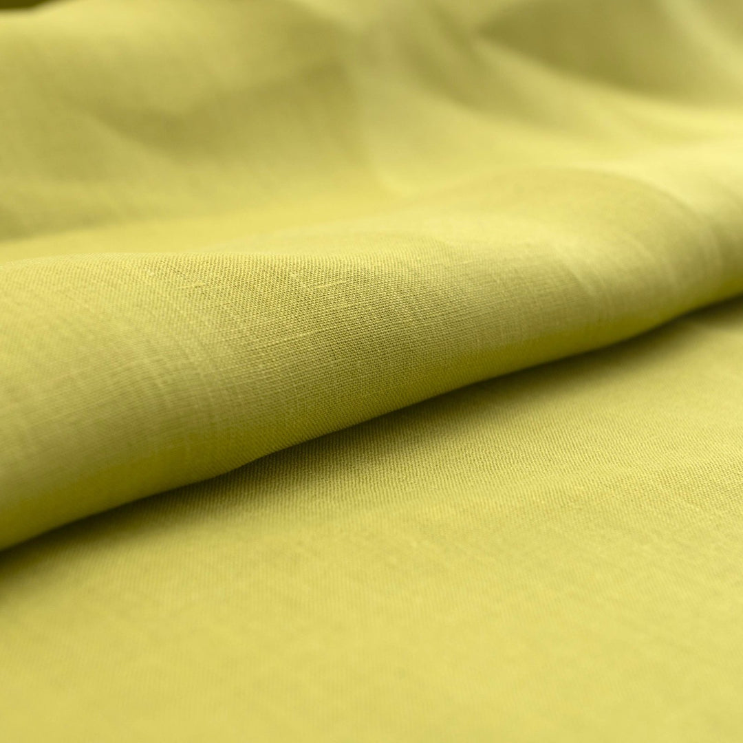 Vibrant apple green linen fabric for sewing summer dresses and tops